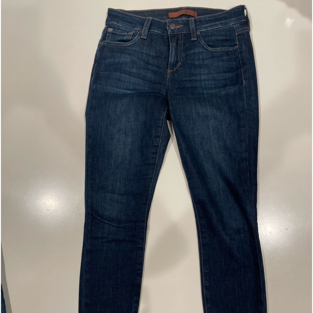 Joe’s dark blue jeans